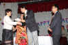 Meghalaya Education Minister, Mr. M Chaudhuri giving away the award to one of the awardee on the occasion of the Teachers' Day celebration at Soso Tham Auditorium
