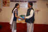  Meghalaya CM, Dr Donkupar Roy presenting the Meghalaya IT Award to one of the meritorious students at the Award ceremony