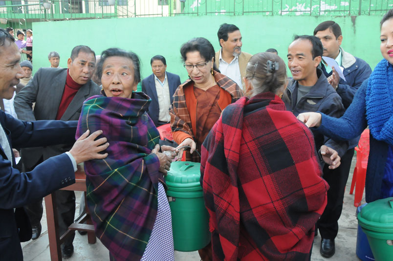 Smti Roshan Warjri, MLA distributing household bins to the residents of Jaiaw