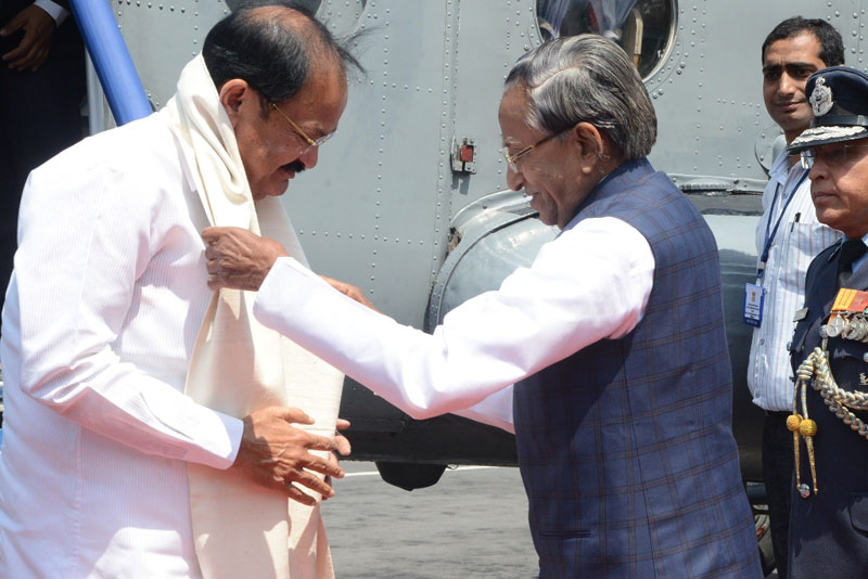Governor, Shri. Ganga Prasad receiving the Vice-President of India, Shri. M. Venkaiah Naidu on his arrival at ALG, Upper Shillong