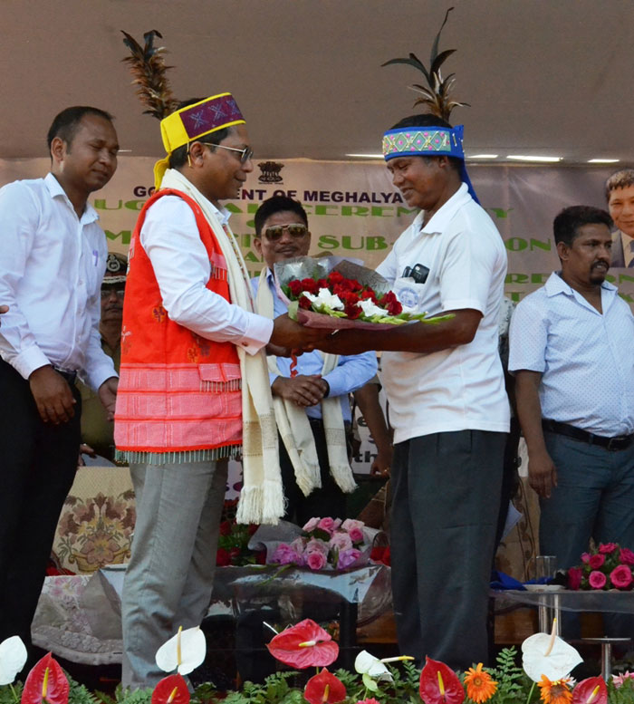 CM Dr Mukul Sangma felicitates one of the three nokmas who donated land for Raksamgre Civil Sub Division