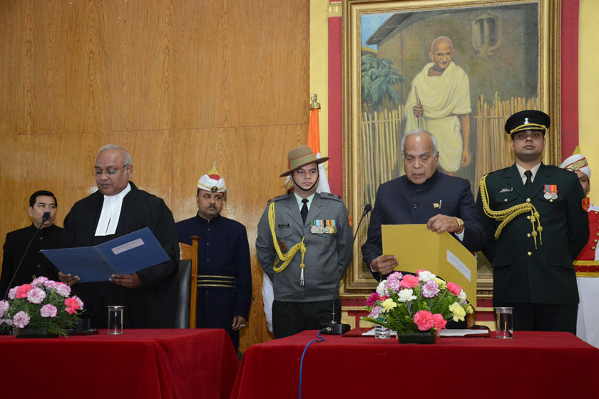  Chief Justice of the High Court of Meghalaya, Justice Dinesh Maheshwari administering the oath of office to the Governor of Meghalaya Shri Banwarilal Purohit