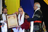 The Dalai Lama being awarded the Honorary  Degree of Doctor of Philosophy at the MLCU Convocation