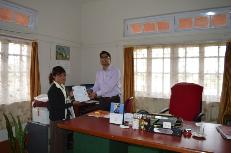 Ankit Kumar Singh, SDO (C) Sohra Sub Division handing over the ST Certificate to the first applicant after the successfull roll out of the e-Services at the Office of the SDO (C), Sohra