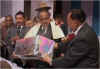 Meghalaya CM, Dr D D Lapang presenting a gift to the Meghalaya Governor, Mr M M Jacob at the farewell meeting held in his honour organised by the State Government at the State Central Library Auditorium