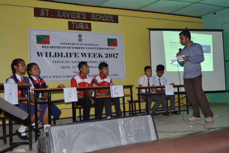 Students of various schools of Tura town participating in the quiz competition held during the Wildlife Week celebration