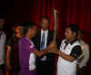 Meghalaya Chief Minister Dr. Mukul Sangma recieving the Queen's Baton relay torch of the 19th Commonwealth Game 2010 as it arrived in Shillong