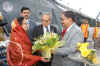 Her Excellency the President of India Smti Pratibha Patil being presented a bouquet of flowers by the Meghalaya Chief Minister, Dr Donkupar Roy on her arrival at the ALG Helipad, Shillong 