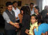 Children from S O S village, Umiam tying Rakhi wristbands to the Meghalaya Chief Minister, Dr Mukul Sangma in his office chamber