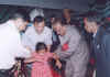 Meghalaya Governor, Mr. M M Jacob distributing the wheel chair to one of the disabled child at the awareness programme on Composite Disability Medical Camp at Bhoilymbong